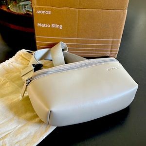 Monos Metro Sling Vegan Leather. New in Box.